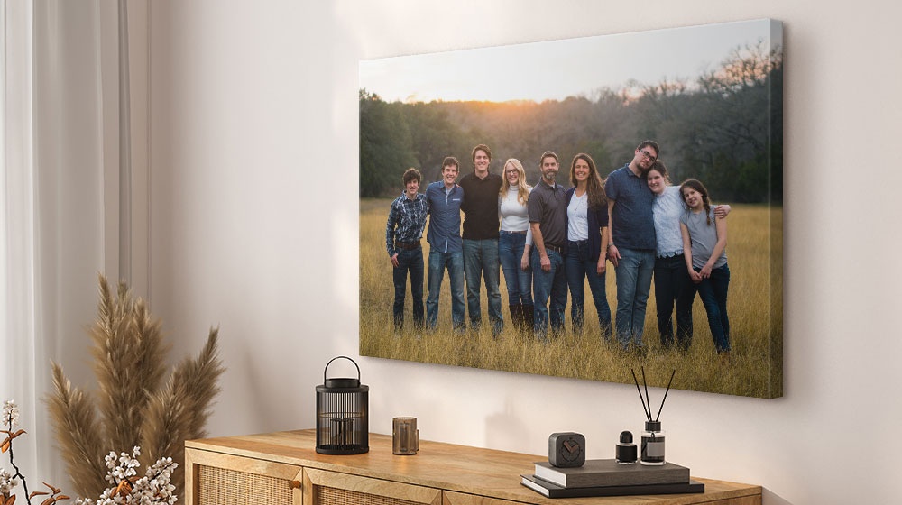 photo of a family printed on a canvas print hanging in a room