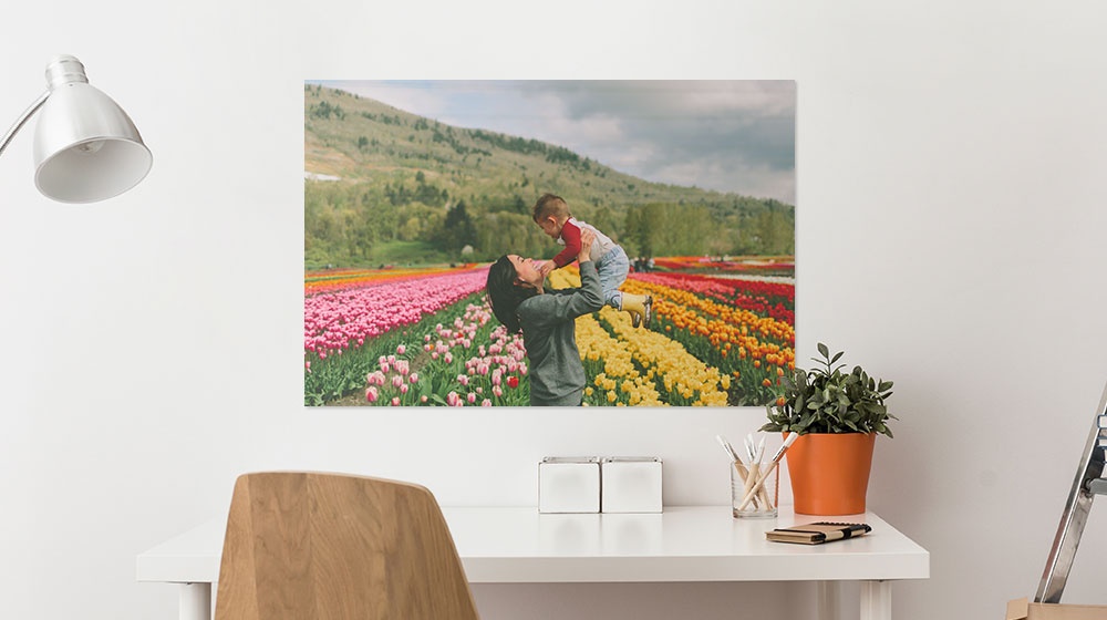 mother and child printed on a poster and hanging over a desk