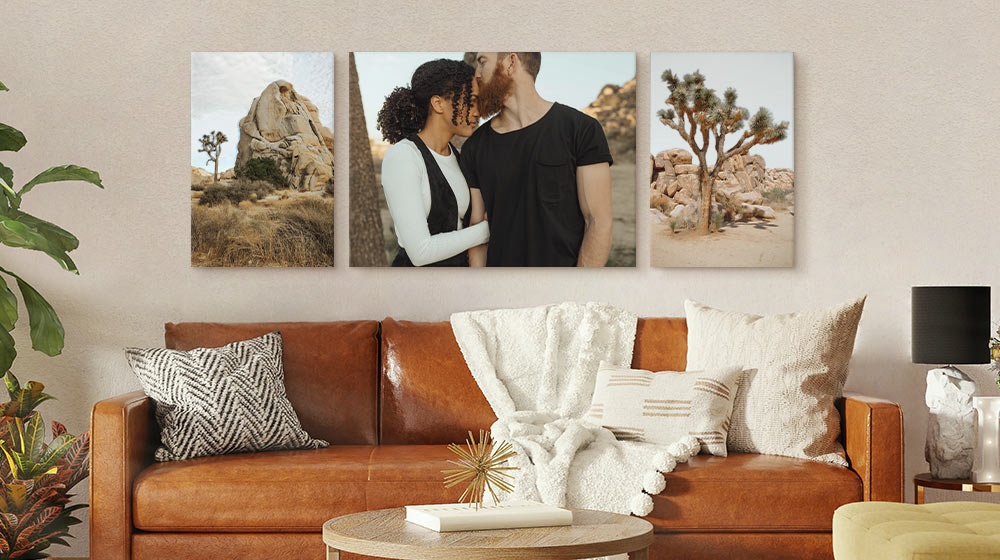 canvas gallery wall display featuring photos of a couple and desert landscapes