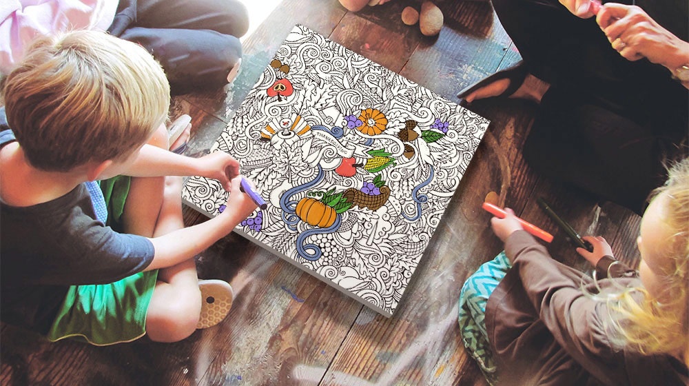 family sharing a coloring canvas