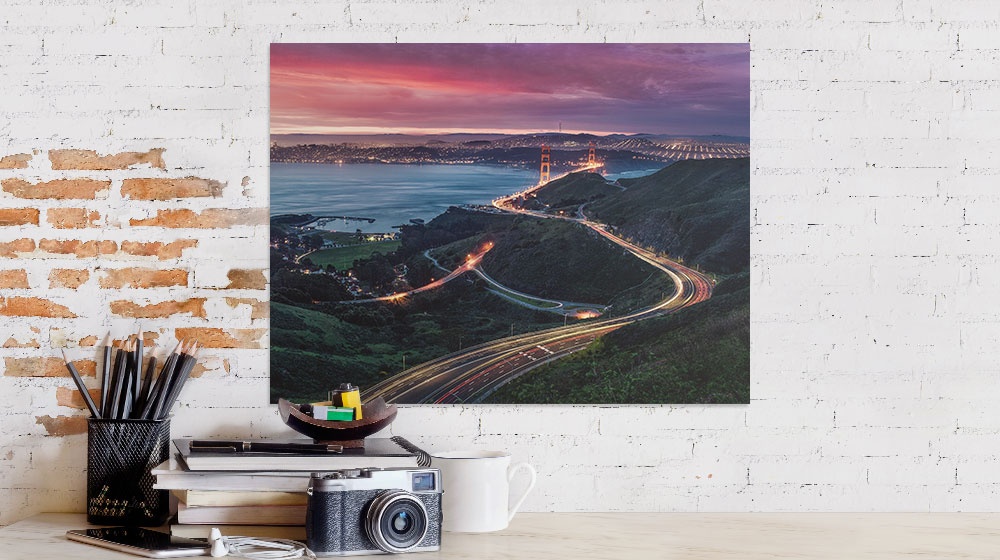 aerial view of a road printed on a poster over a desk