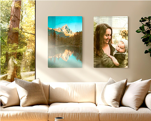 two metal prints of a mother and baby boy and mountains