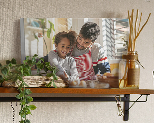 canvas print of a father and daughter cooking in the kitchen