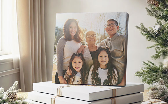 Three canvases with a variety of family photos